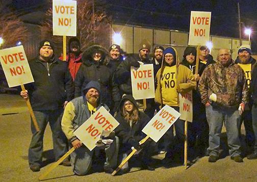 Members of Local 89 in Louisville, Ky., show where they stand on the UPS contract