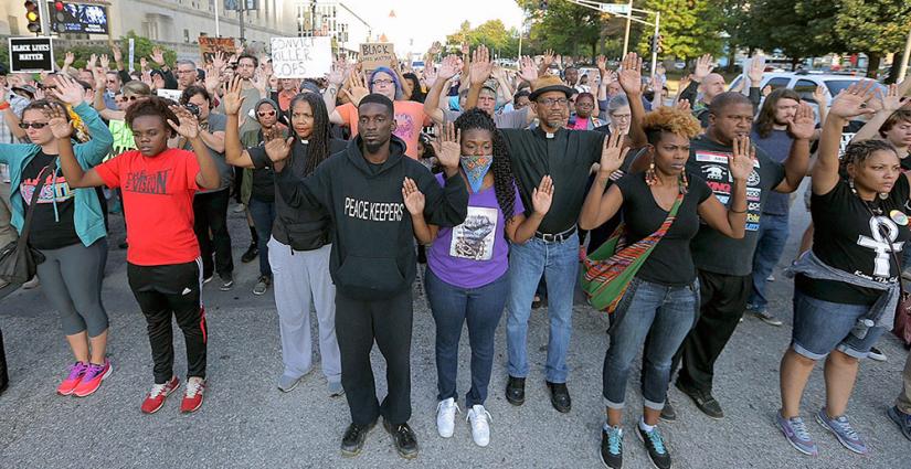 Protesters pour into the streets of St. Louis to demand justice for Anthony Lamar Smith