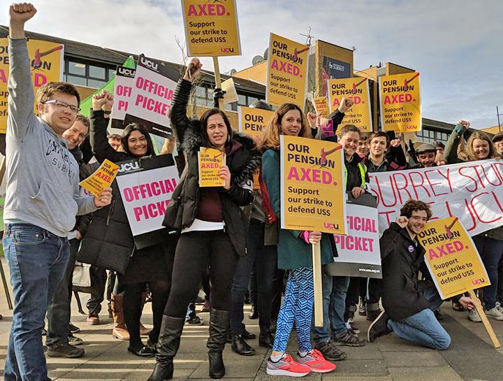Striking university workers on the picket lines in Surrey, southwest of London