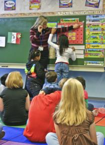 A teacher leads her students through a lesson