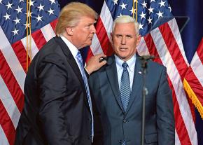 Donald Trump and Mike Pence greet supporters after a speech in Phoenix